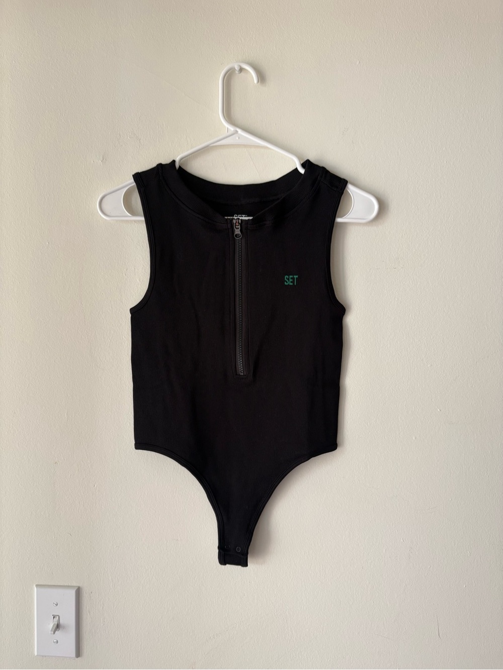 SET Black Sleeveless Zip-Front Bodysuit with Green Logo